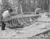 A freeboard being installed onto an aspen dugout canoe in Ahlainen, 1935. Photo: Eino Nikkilä / Picture Collections of the Finnish Heritage Agency. Objektinumero: KK1976:97